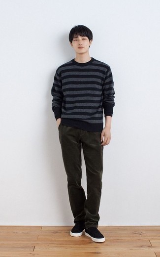 Slip-on Sneakers Outfits For Men: Tone down on the formality in this functional pairing of a navy horizontal striped crew-neck sweater and dark green chinos. Slip-on sneakers will be a stylish companion to this outfit.