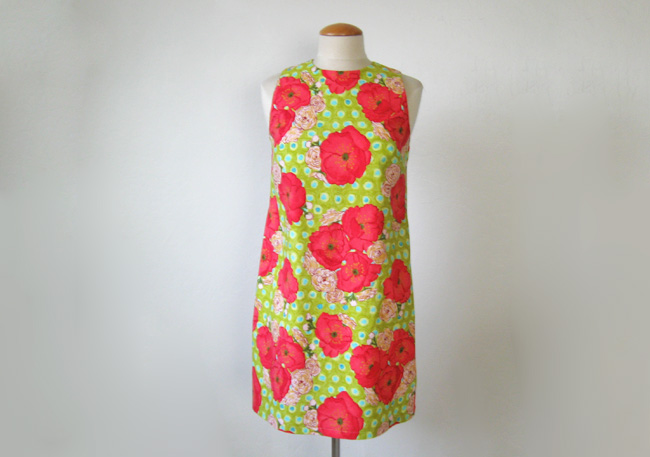 sleeveless summer dress in green poppy print