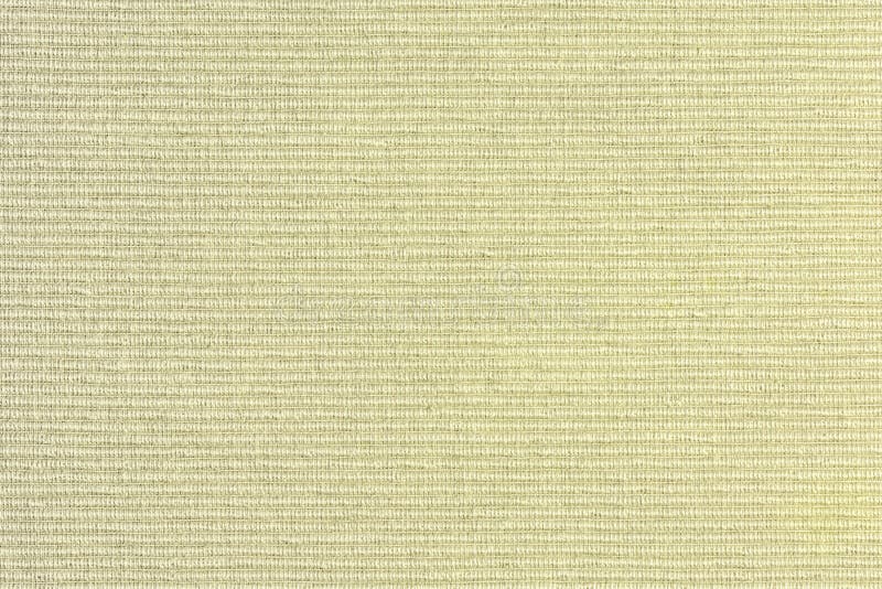Abstract blank background for layouts. Thick yellow upholstery fabric closeup. Light photo stock photos