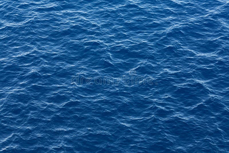 Blue ocean water texture stock images