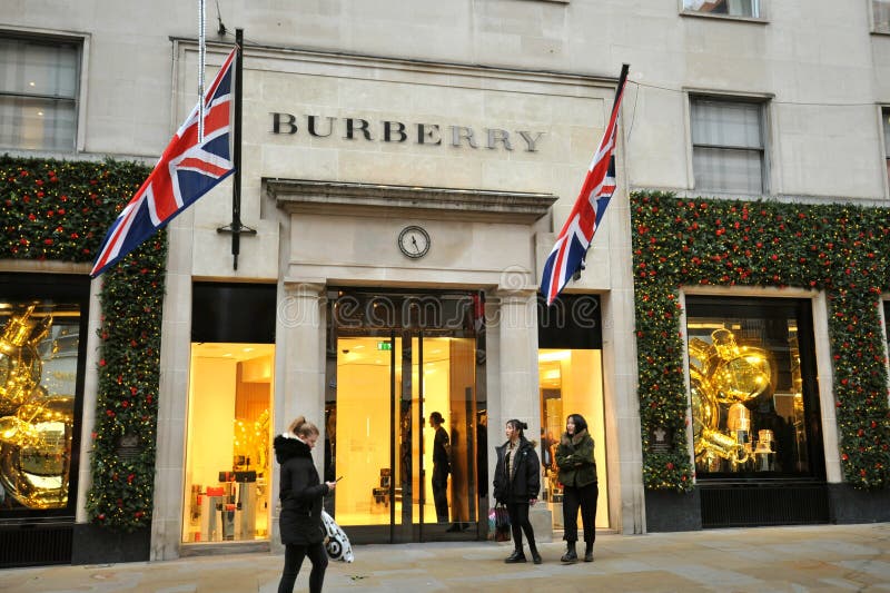 Burberry luxury fashion store in London, England. Burberry Group PLC is a British luxury fashion house headquartered in London, England. Its main fashion house royalty free stock photo