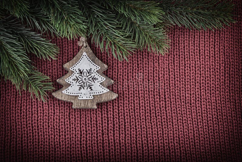 Christmas Vintage Decoration on Wool Knitted Background royalty free stock photo