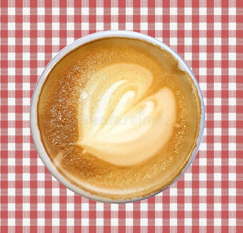 Coffee latte decorated with milk foam made in the form of a pattern.  royalty free stock photo