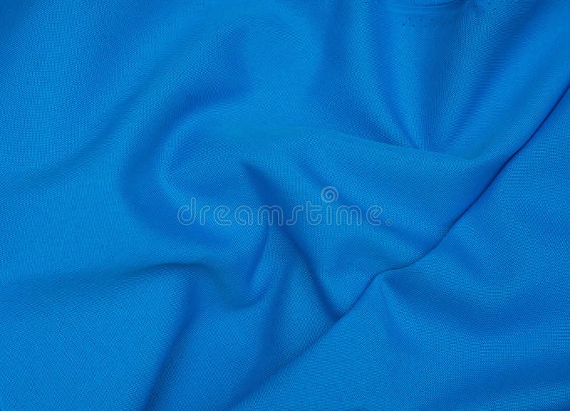 Creased blue gabardine. Rumpled texture. Folded fabric. Creased blue gabardine. Rumpled texture royalty free stock photography