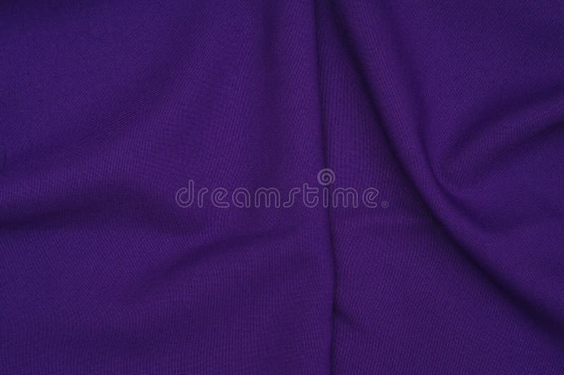 Creased purple gabardine. Rumpled texture. Folded fabric. Creased purple gabardine. Rumpled texture stock photography