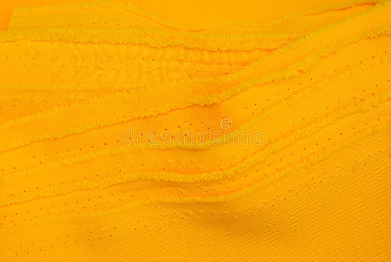 Creased yellow gabardine. Rumpled texture. Folded fabric. Creased yellow gabardine. Rumpled texture royalty free stock photos