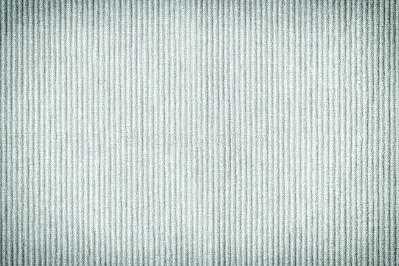 Dense fabric upholstery light blue. Texture of coarse fabric, closeup. Blank background for layouts. Dense fabric upholstery light blue. Texture of coarse royalty free stock images