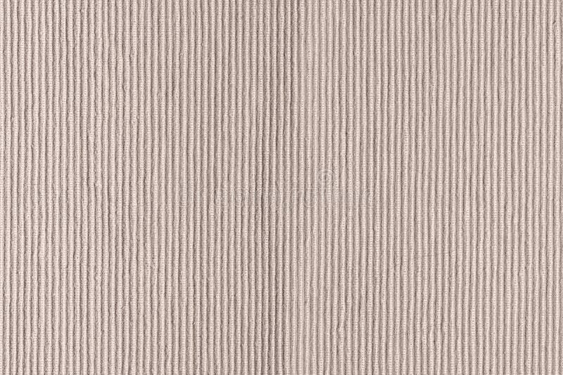 Dense woven ribbed texture. Upholstery fabric close up. Empty beige background for layouts. Dense woven ribbed texture. Upholstery fabric close up. Empty light stock photos