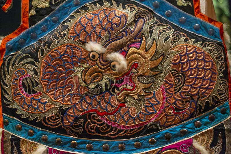 Dragon Embroidery. Embroidery of oriental Asian dragon royalty free stock photo