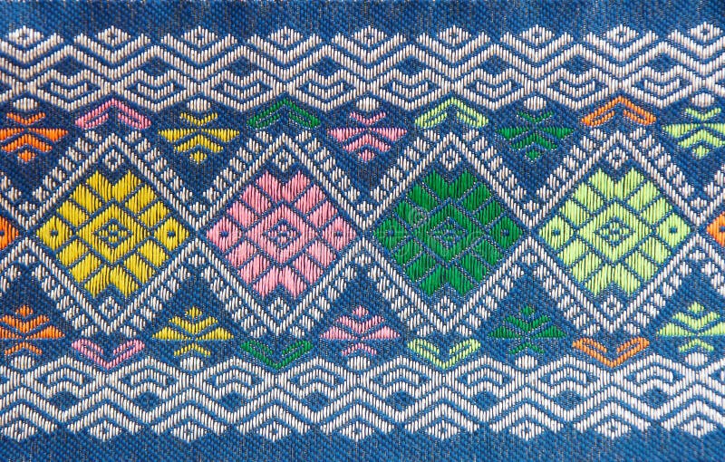 Embroidery. The blue cloth with colorized embroidery stock photo