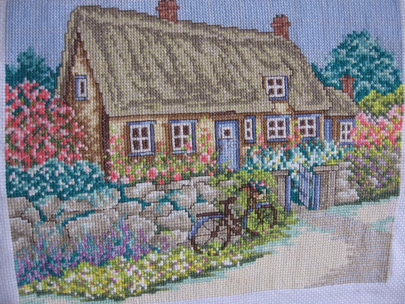Embroidery. Needlework stitching house parterre stock images