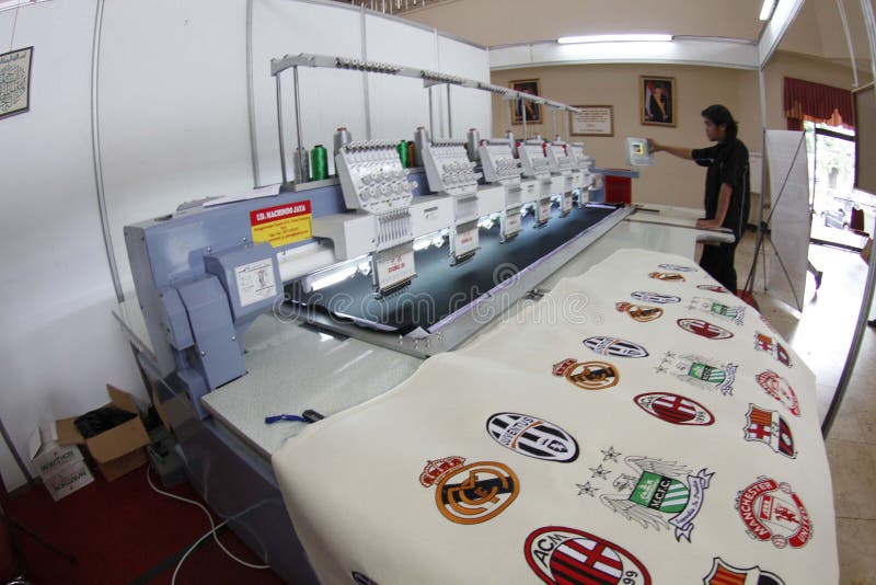 Embroidery. Operator was operating embroidery machine in the city of Solo, Central Java, Indonesia royalty free stock image