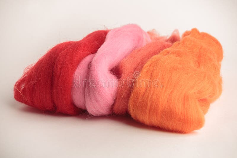 felting natural wool close-up with felt stock photo