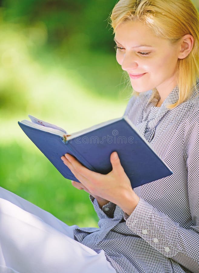 Female literature. Relax leisure an hobby concept. Best self help books for women. Books every girl should read. Girl. Concentrated sit park read book nature royalty free stock photography