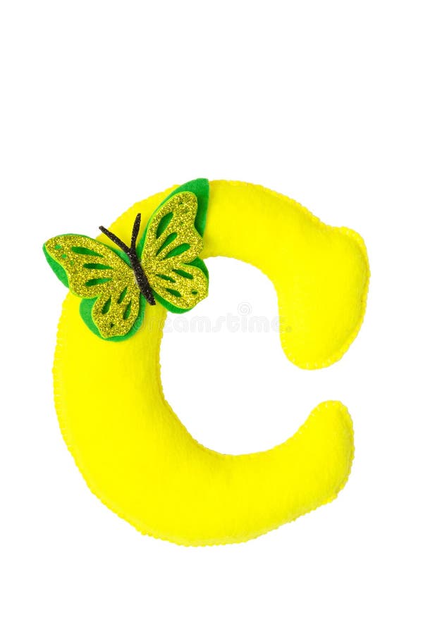 Handmade yellow letter C made of felt stock images
