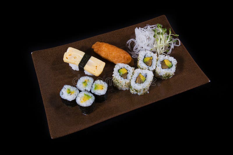 Japanese food. Japanese sushi, seafood, salmon fresh squid, salmon vegetalbe green fresh, shirmp, sashimi, fried, udon octopus rice, cake, mochi royalty free stock images