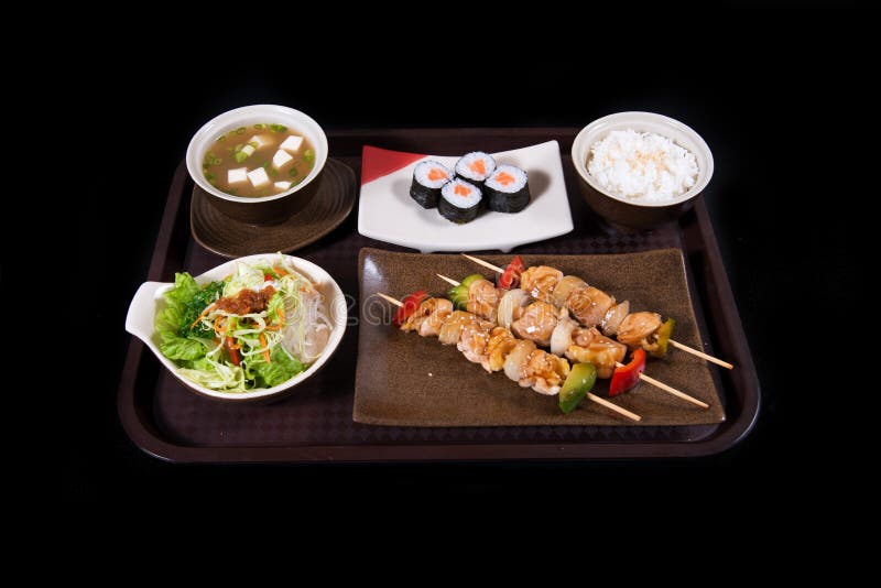 Japanese food. Japanese sushi, seafood, salmon fresh squid, salmon vegetalbe green fresh, shirmp, sashimi, fried, udon octopus rice, cake, mochi royalty free stock photo