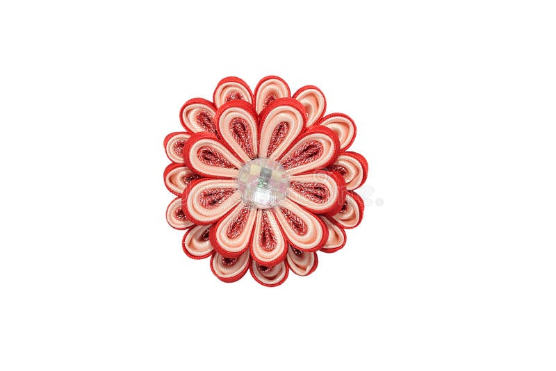 Kanzashi. Red artificial flower with brocade isolated on white b. Kanzashi. Red artificial flower with brocade isolated on white stock photography