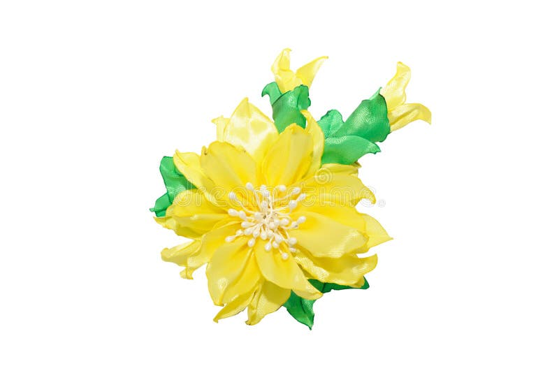 Kanzashi. Yellow artificial flower isolated on white background. Kanzashi. Yellow artificial flower isolated on white stock photos