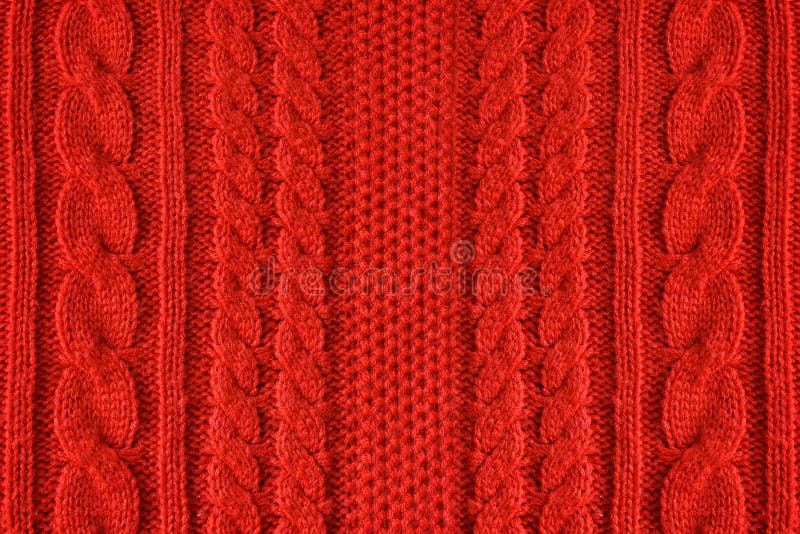 Knitted woolen background, red texture royalty free stock images