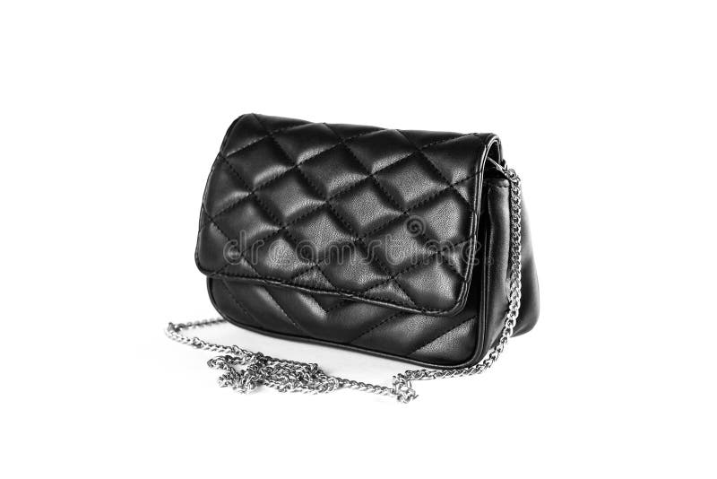A little black leather woman`s handbag. Clutch. Close up. Isolat royalty free stock photography