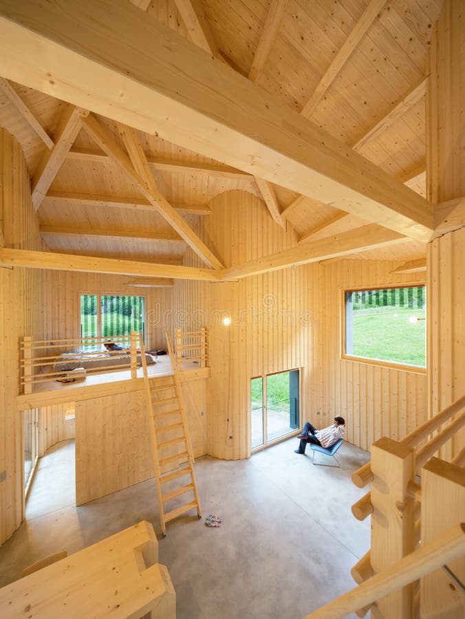 Interior of modrn wooden house. Modern house, wooden interiors open space. Project by Daniel Buren and Davide Macullo stock photography