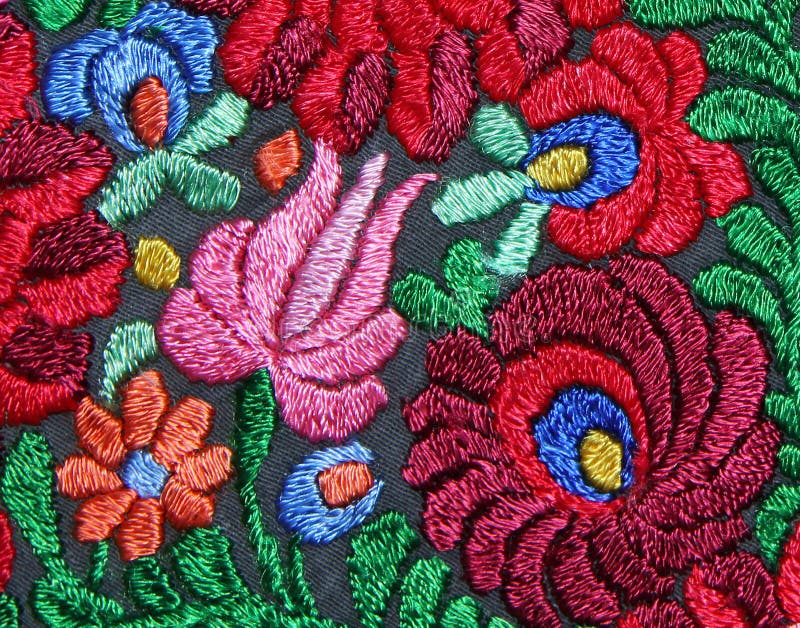 Multicolor floral hand embroidery pattern. Background royalty free stock image