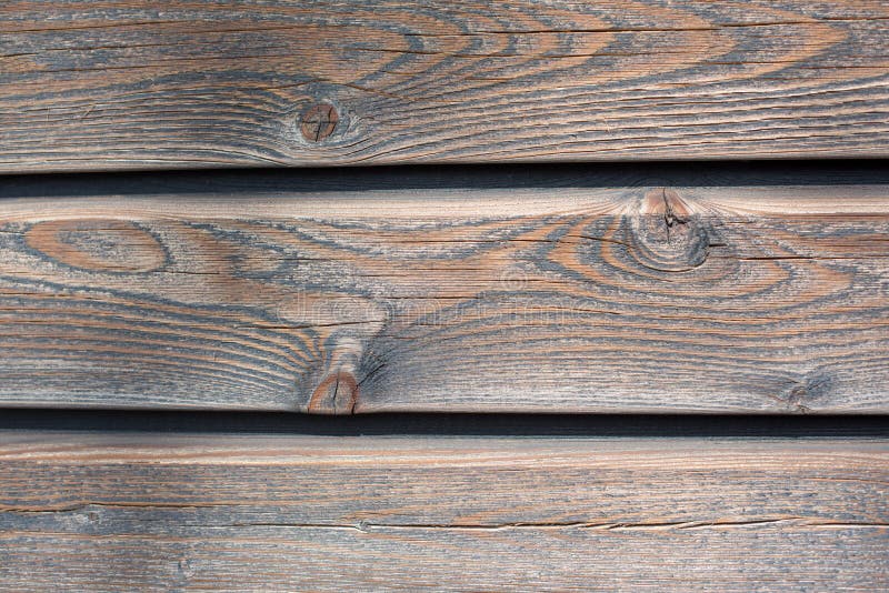 Old wooden wall with knots stock photo