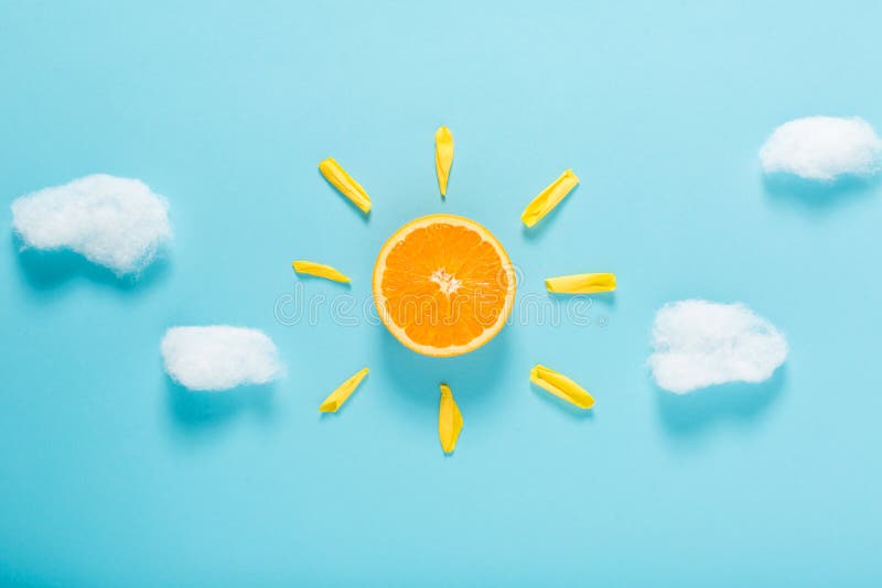 Orange slice as the sun concept royalty free stock images