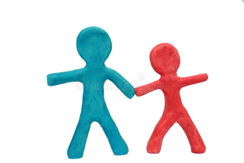 Plasticine Friends. Two plasticine figures holding hands royalty free stock photos
