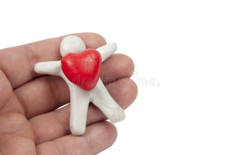 Plasticine heart. In your hand stock photography