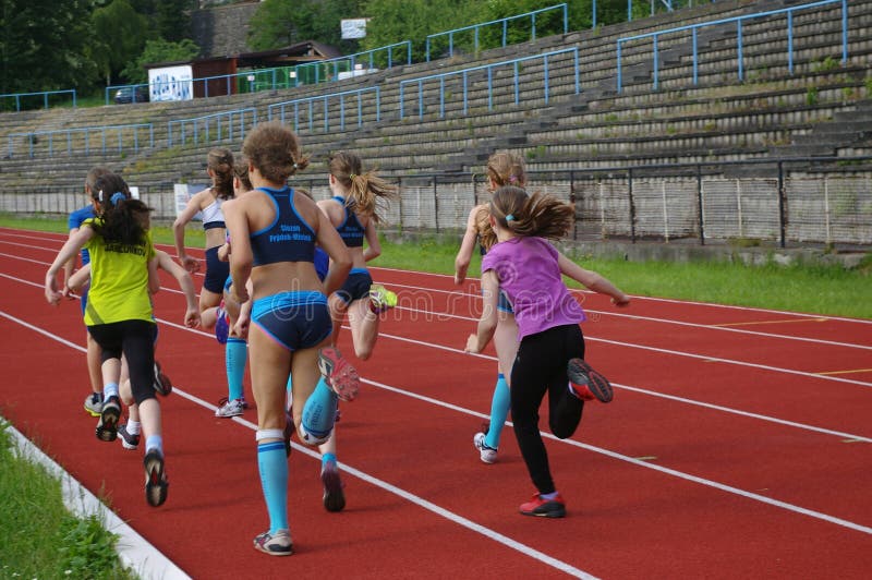 Running girls. Young girl runners at so called Chocolate Spike, Frýdek, Silesia, Czech Republic stock photo
