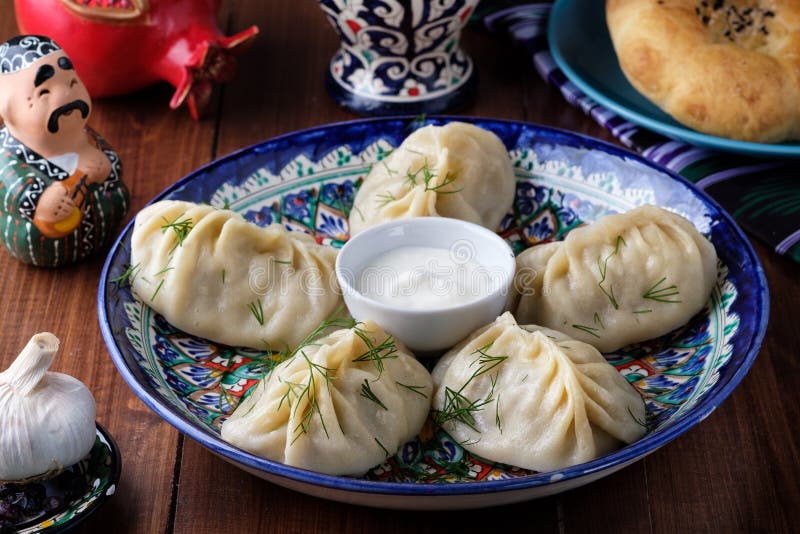 Stuffed dumplings, manti of dough and minced, close up. Stuffed dumplings, manti of dough and minced royalty free stock photography