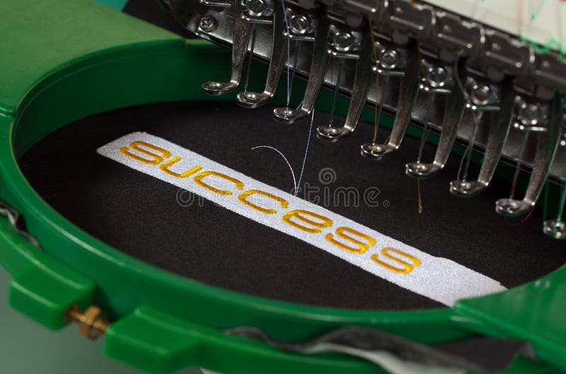 Success embroidery. Textile embroidery machine in Textile Industry stock photos