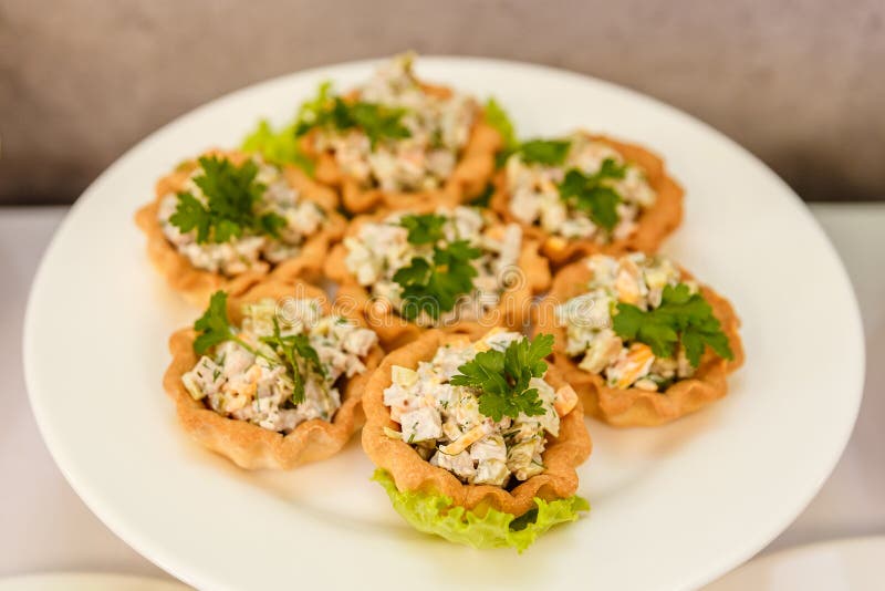 Tartlets with Salad Greens and olive royalty free stock photos