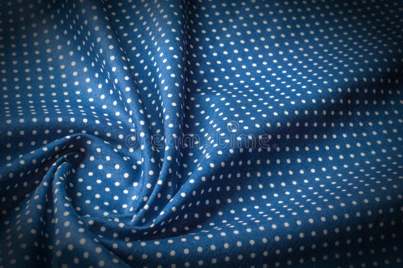 Texture background pattern. Silk fabric, blue cloth in white pea stock photography