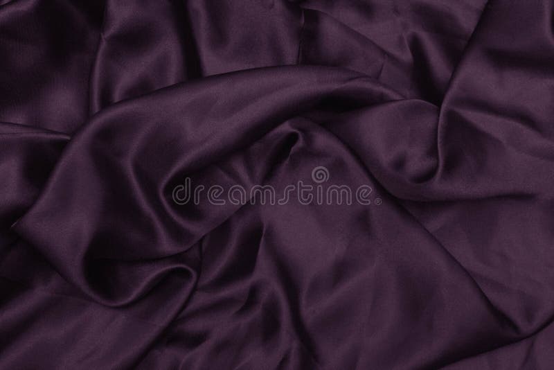 Texture satin. silk background. shiny wavy pattern canvas. color fabric, cloth purple stock photography