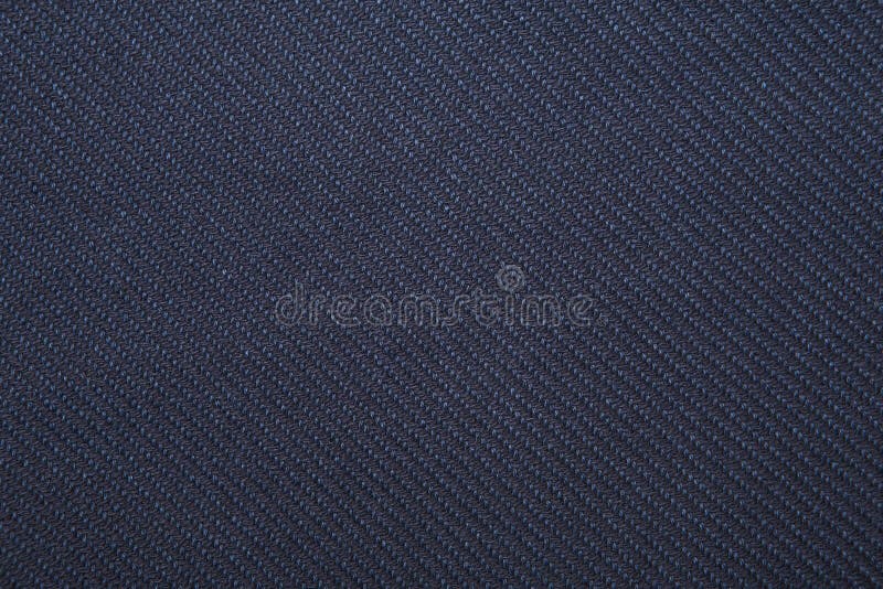 Twill weave fabric pattern texture background closeup. Navy twill weave fabric pattern texture background closeup royalty free stock photo