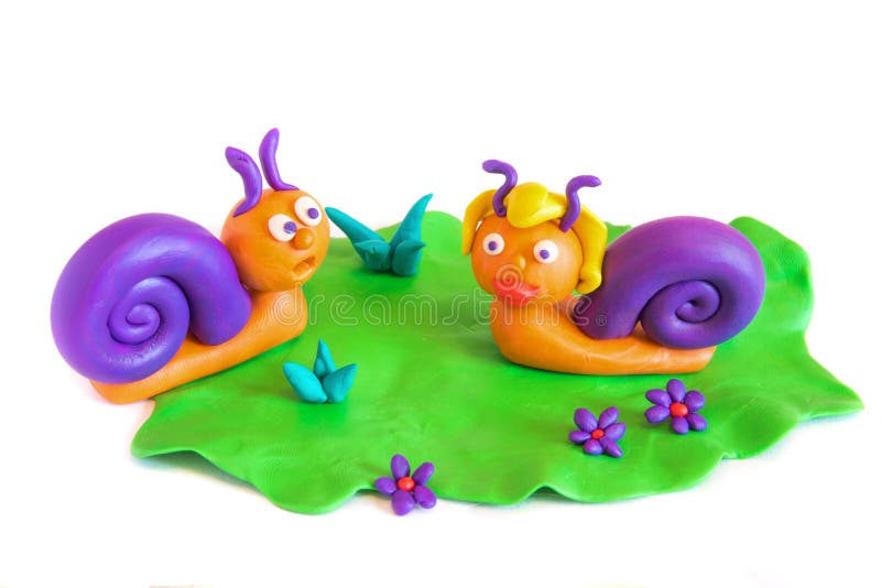 Two snails, clay modeling. stock photography
