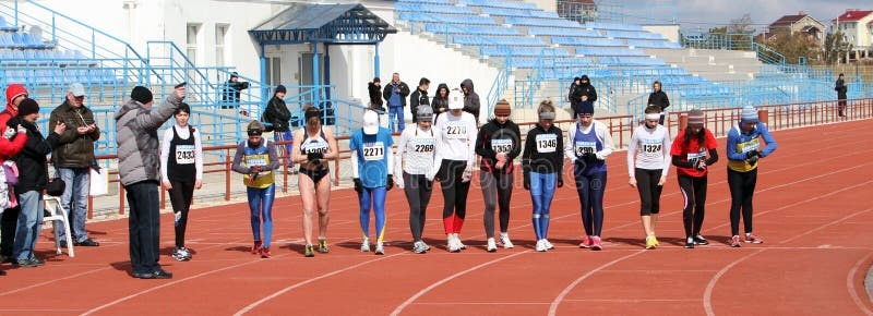 Unidentified girls at the 20,000 meters race walk. On Ukrainian Race Walk Track & Field Championships on March 06, 2012 in Yevpatoriya, Ukraine royalty free stock photography