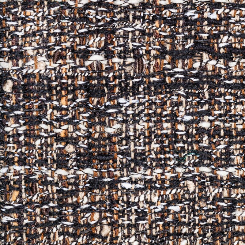 Weaving of threads in motley boucle fabric. Textile square background - weaving of threads in motley boucle fabric close up stock photography
