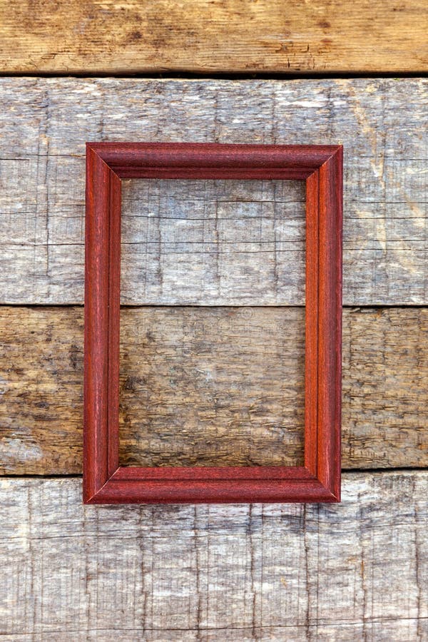 Wooden frame on wooden background royalty free stock photos