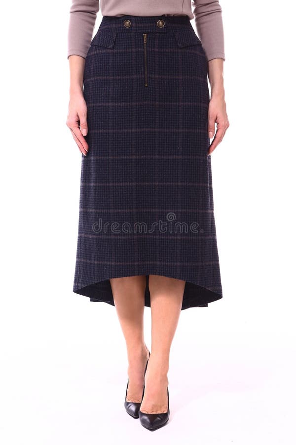 Woolen checked flared skirt on model. Close up photo royalty free stock images
