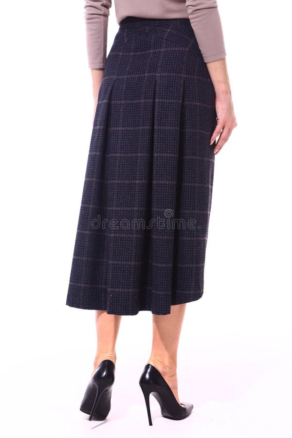 Woolen checked flared skirt on model. Close up photo royalty free stock photos