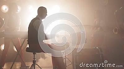 Elegant drummer performing with friends in the cabarets stock footage