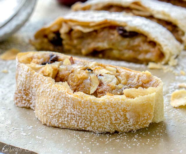 Wiener Apfelstrudel is a classic Viennese apple dessert that you probably know by the name of Apple Strudel. Flaky layers of strudel dough encase a bright fall apple filling that is studded with raisins and almonds. If you love apple pie, apple strudel is sure to be a winning recipe! 