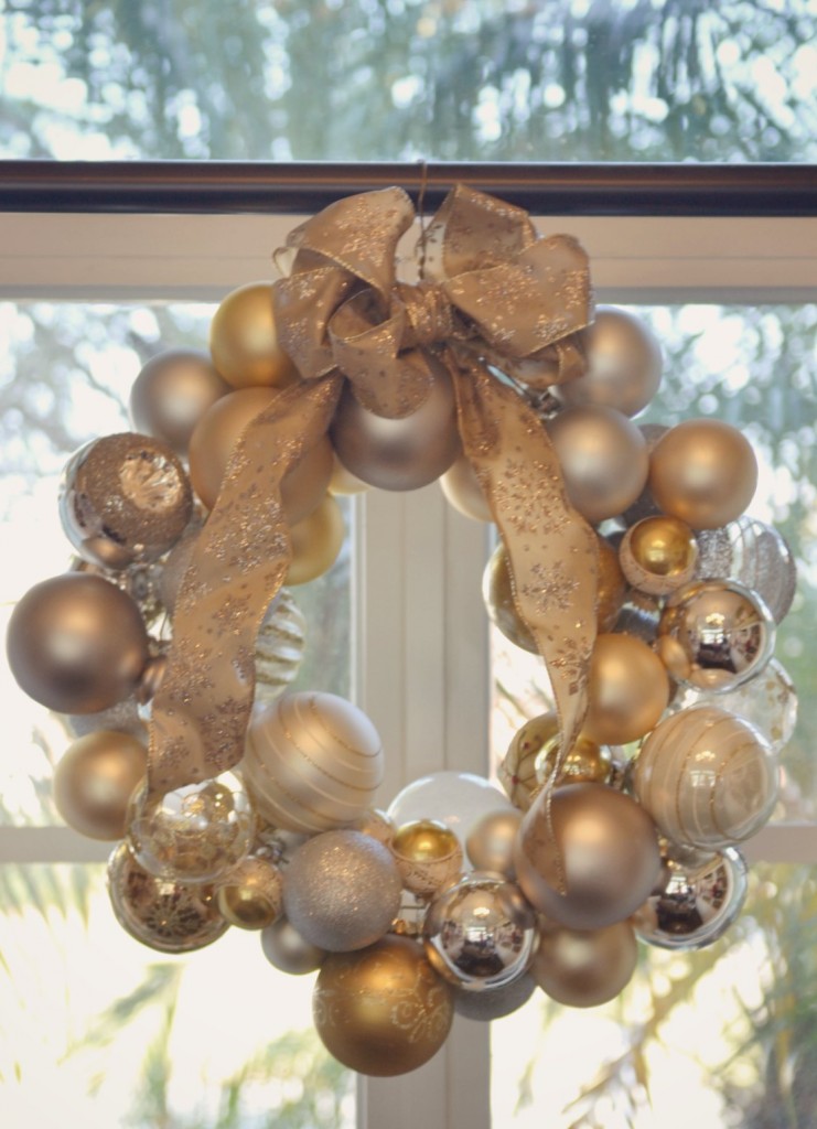 A bow on top adds a nice festive touch to the ornament wreath. 